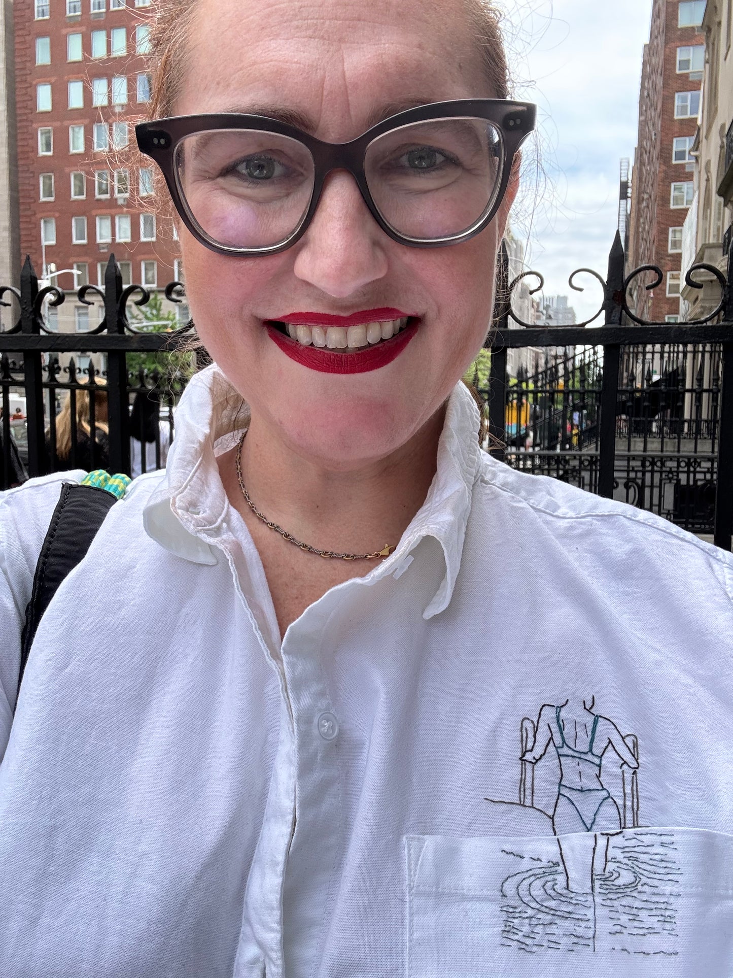 Woman Getting Out of Pool Hand Embroidered Women’s Button Down