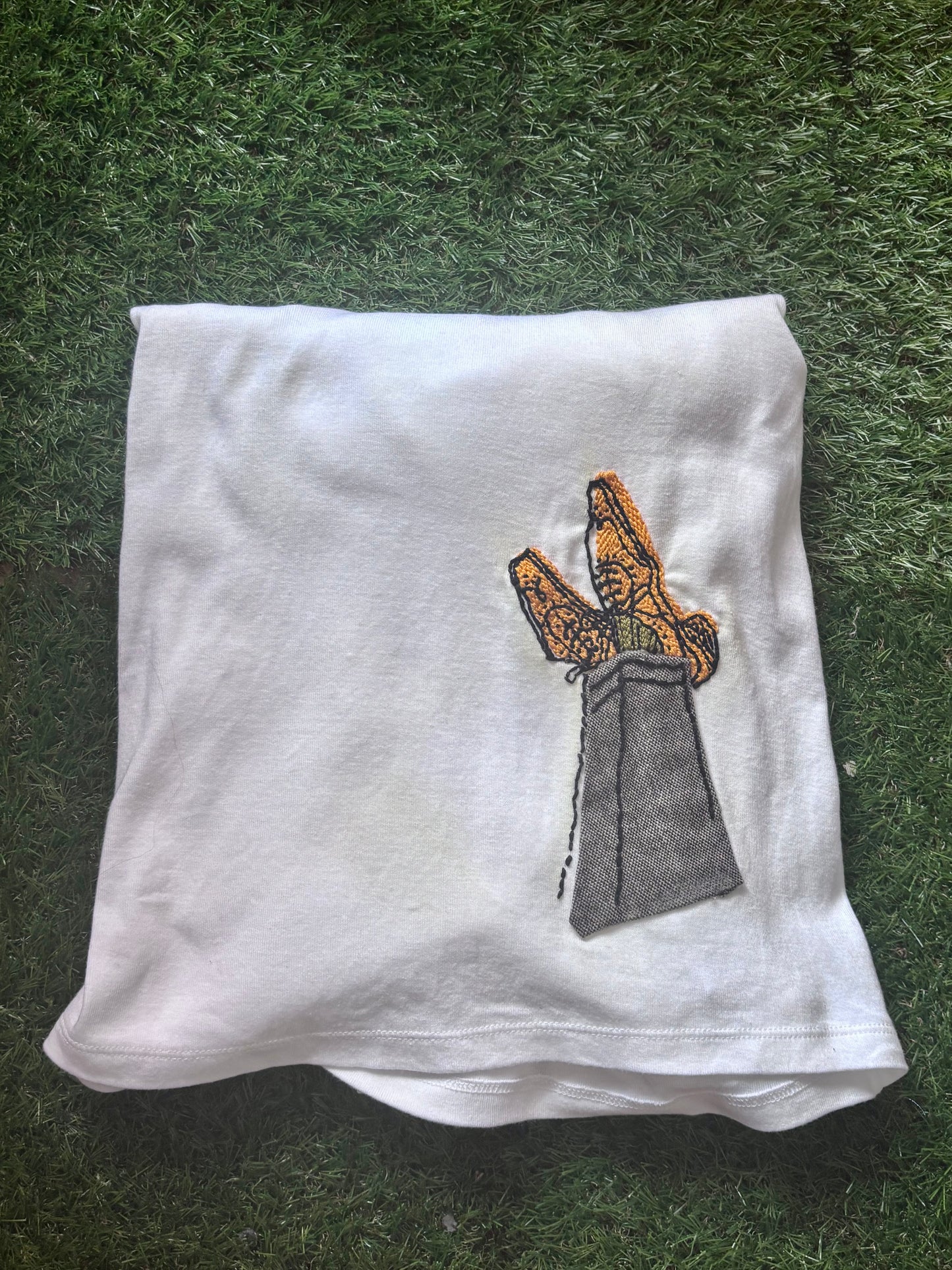 Crossed Tweed Legs with Hand Embroidered Shoes and Socks on White Tshirt