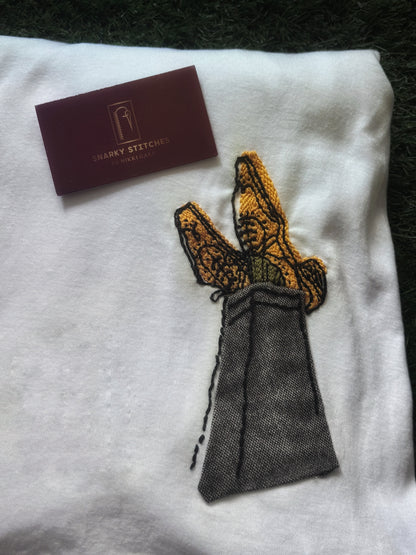 Crossed Tweed Legs with Hand Embroidered Shoes and Socks on White Tshirt