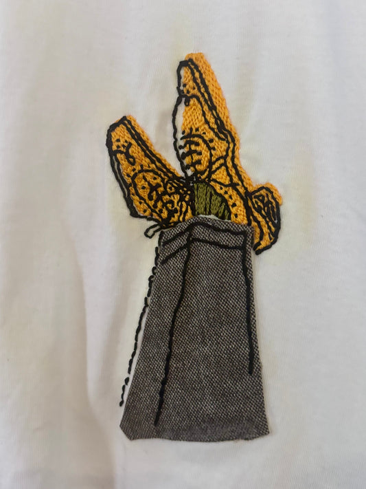 Crossed Tweed Legs with Hand Embroidered Shoes and Socks on White Tshirt