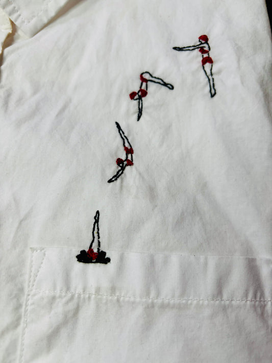 Woman Diving into Pocket Hand Embroidered Women’s Button Down