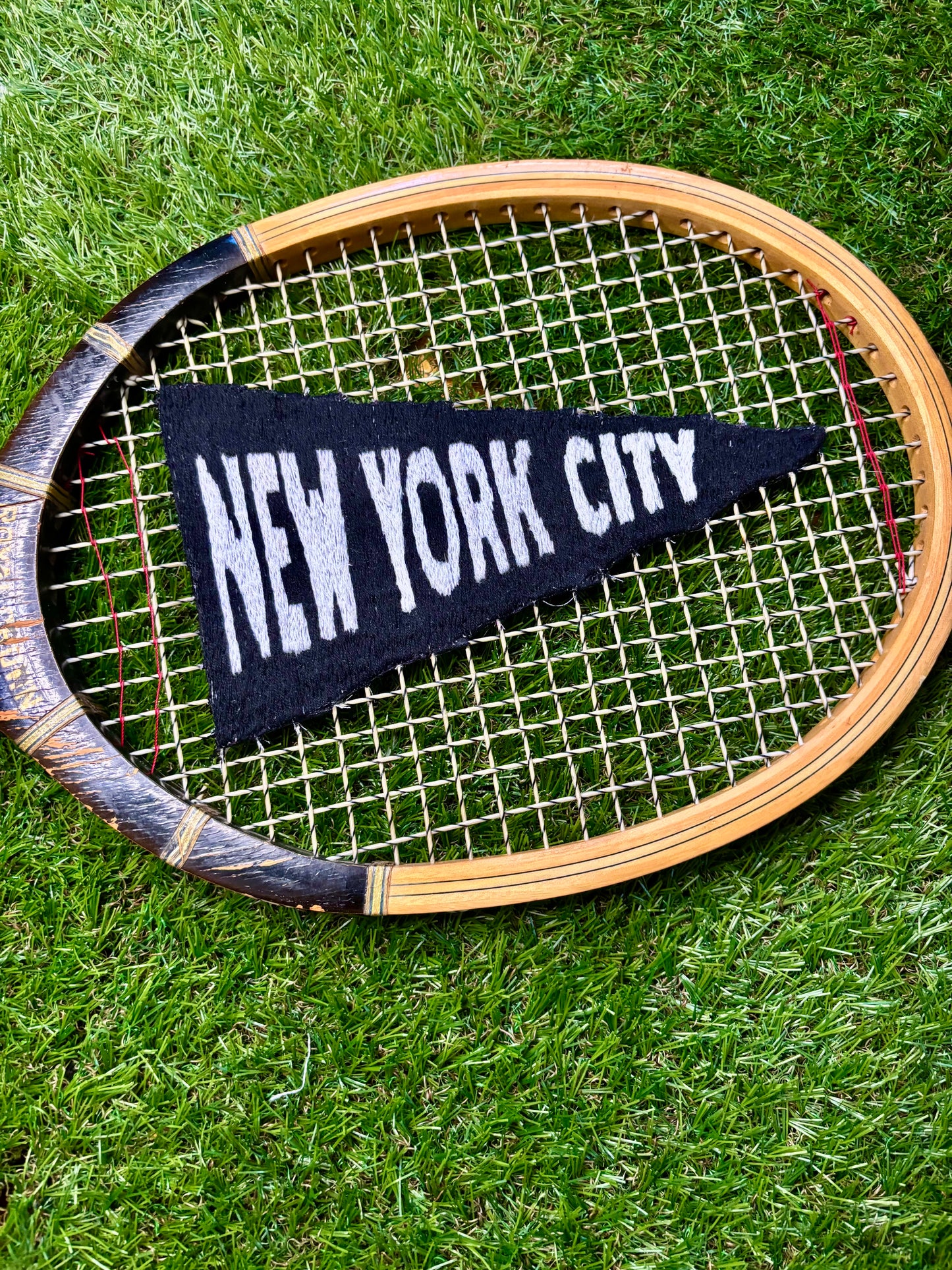 "New York City" — Hand-Embroidered Vintage Tennis Racket Wall Art — Black & White Thread Woven Through the Strings, No Felt, No Shortcuts, Every Racket Unique